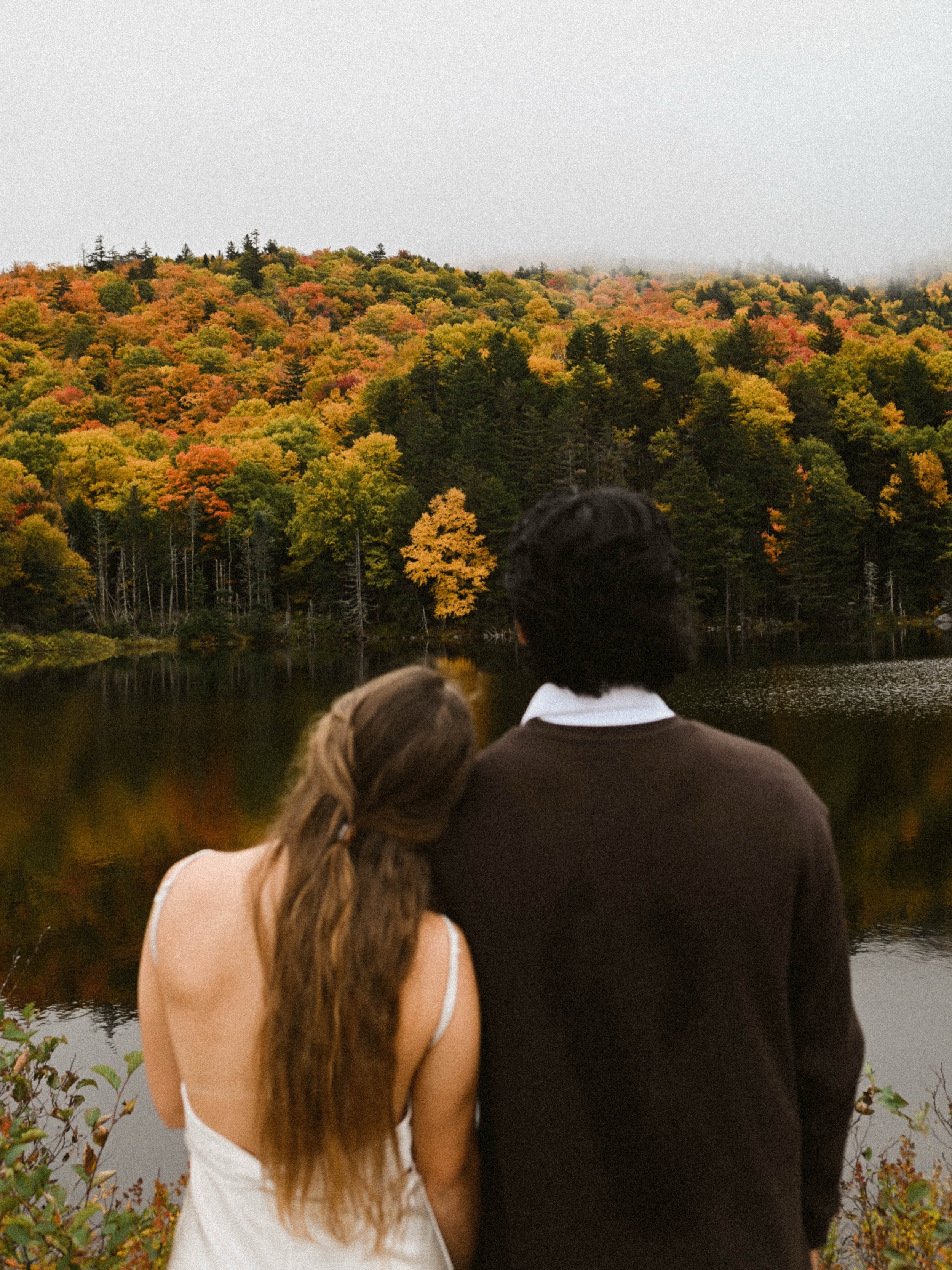 Yesterday&rsquo;s engagement session with Sam and Dylan in the White Mountains was wild. When we woke up, we woke up to clear blue sunny skies, and driving through the mountains the clouds settled in and it started raining. The rain abated by the tim