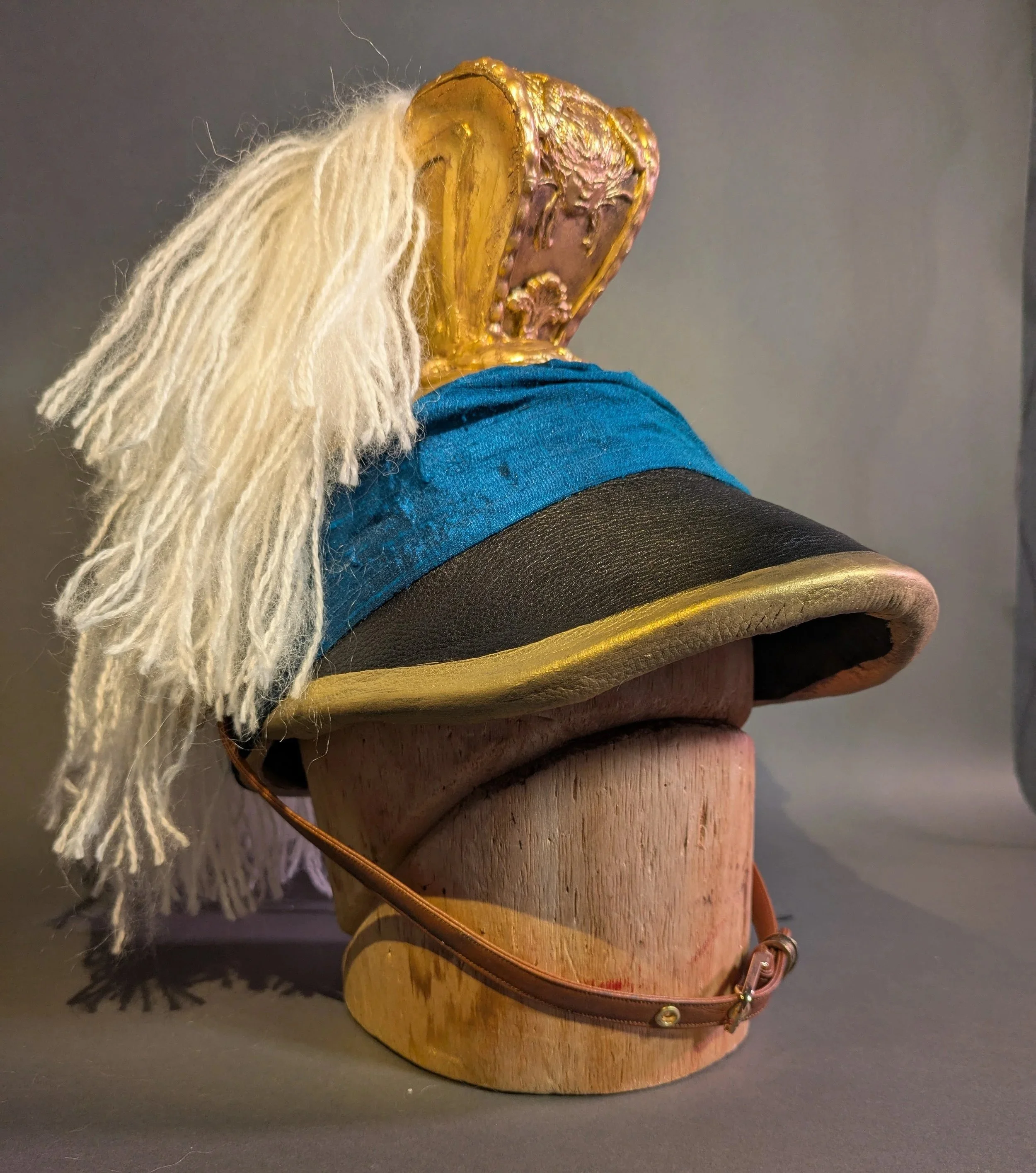 Based on surviving documents and contemporary media, this helmet is a recreation of those worn by officers in the 2nd Continental Light Dragoons during The American Revolution ( 1776-1783).    Materials: 
-Augmented Roman Helmet Pattern 
-8mm EVA Foa