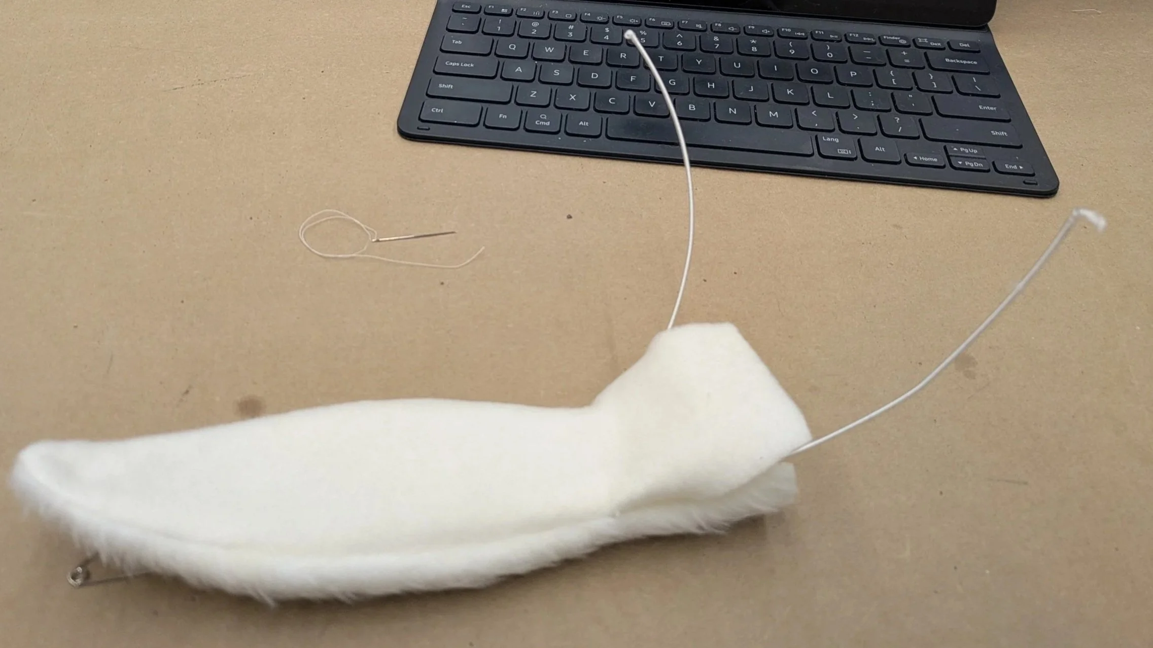 Based on the White Rabbit from Alice in Wonderland fame, this puppet was designed for Puppet theater and Ballet Performances.  Materials: 
-Upholstery Foam
-Barge Shoe Glue
-Faux Fur
-White Stretch Fleece
-Oven Baked Clay
-Hat Wire
-Red paint
-Pink p