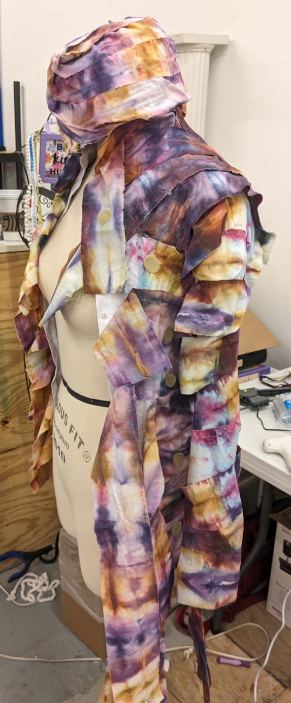 Jacket and Hat from Oracle of Delphi Costume for Scranton Shakespeare Festival's  The Lightning Thief: The Percy Jackson Musical designed by Marissa Anthony- Duricko. Inspired hippie culture and summer camp arts and crafts.
Materials:  Base of White 