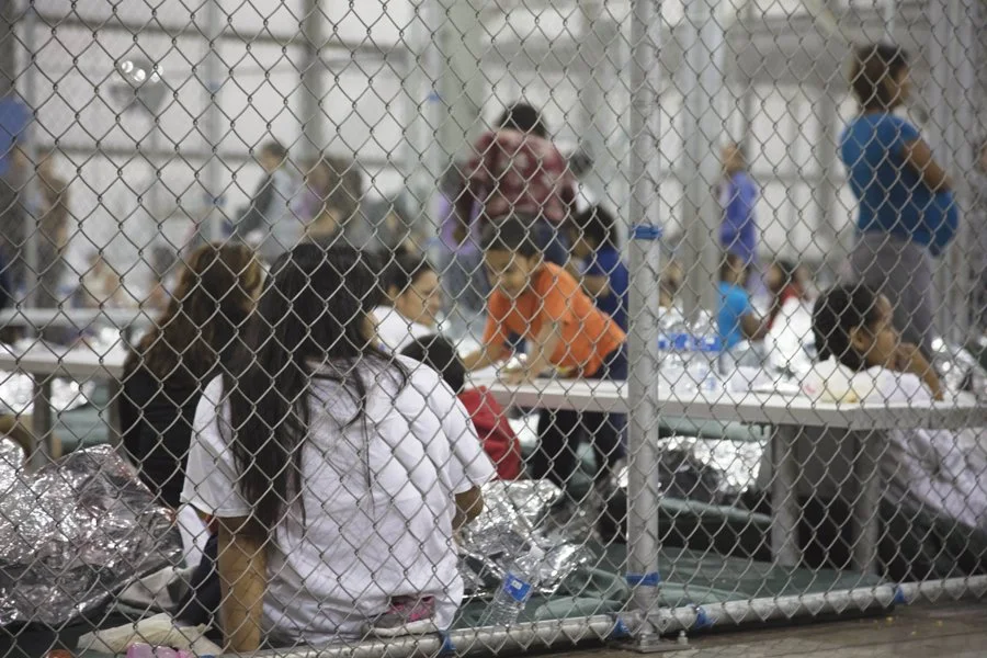 Depicts people in a private detention facility