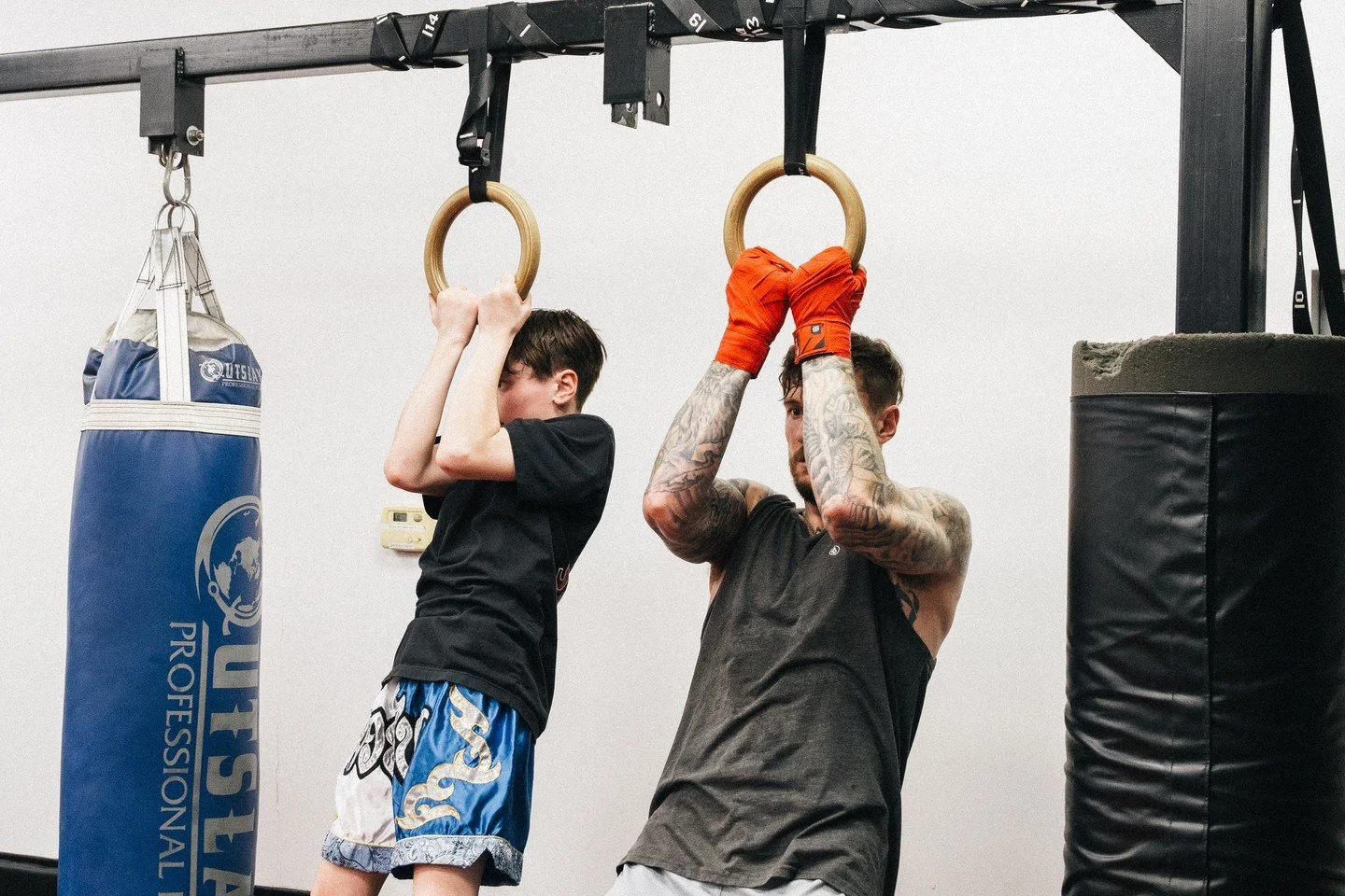 Group strength training at Rebel is all about pushing limits, building power, and staying accountable alongside your team. 

From explosive movements to controlled lifts, every rep is designed to make you stronger for the fight and for life.

Train h