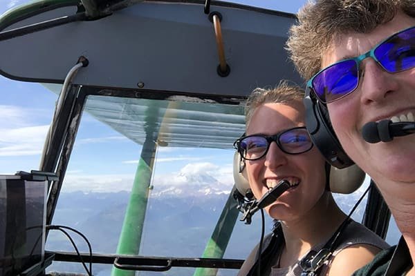 PA-18 Super Cub float plane on lake, Alaska float plane training scenic photo