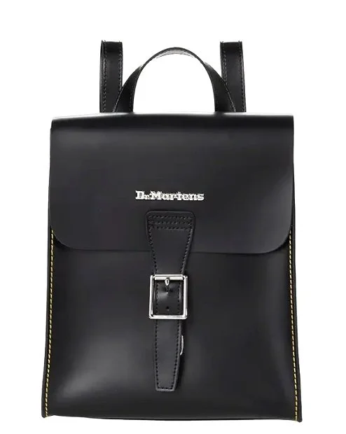 Black leather backpack with a flap, buckle, and the brand name Dr. Martens on the front.