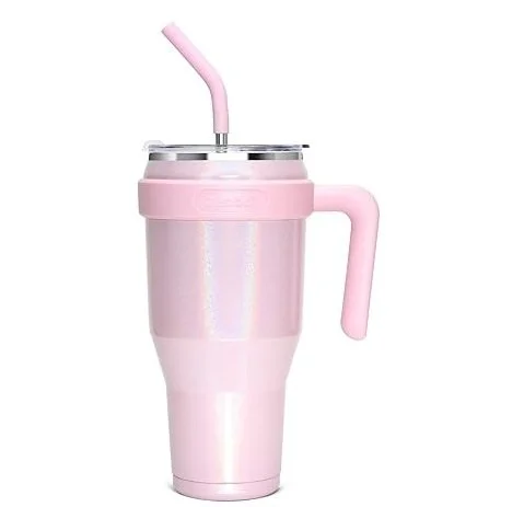 Pink insulated travel tumbler with a handle and a pink straw.