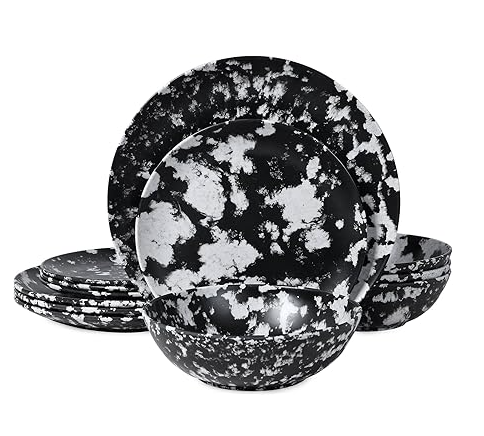Black and white marble-patterned dinnerware set including plates and bowls.
