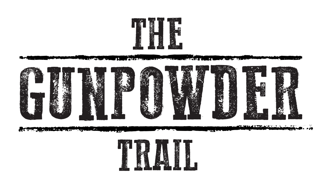 Text reading 'The Gunpowder Trail' in a bold, dark font.