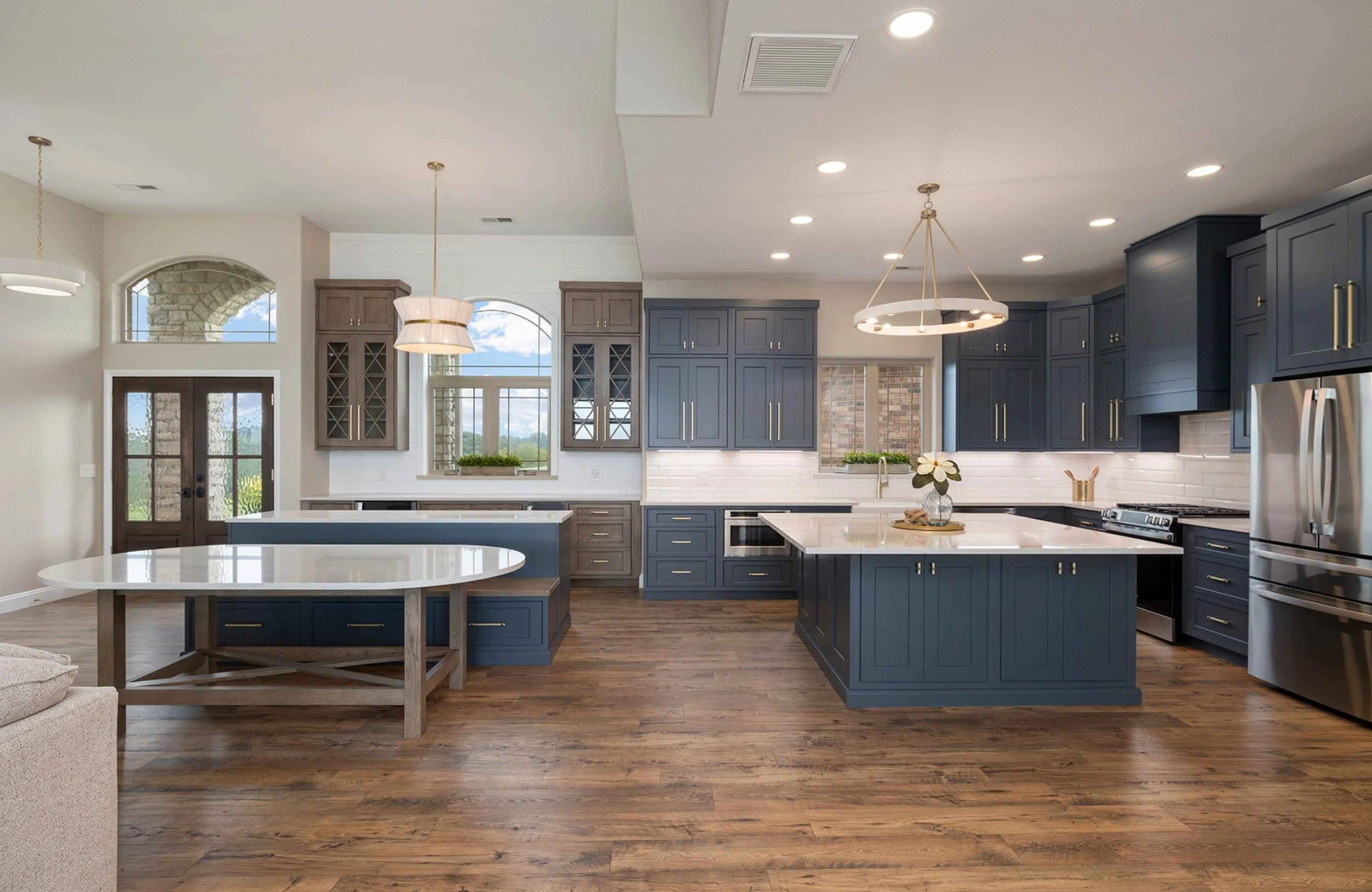 full-service-interior-design-lampe-mo-full-gut-renovation-innovative-kitchen-design-blue-cabinets-white-quartz-countertop-custom-dining-table-lake-home.jpg