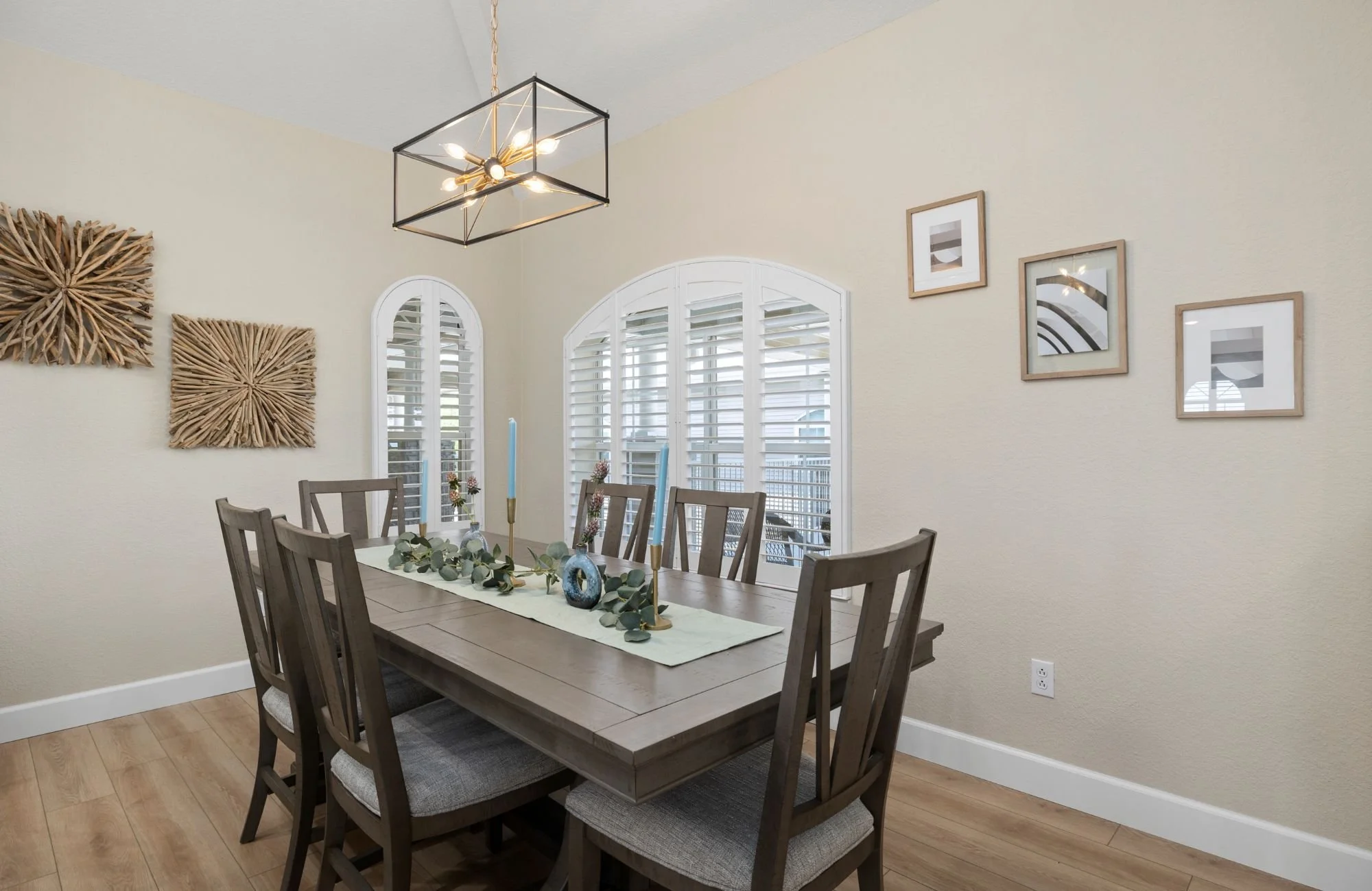 full-service-interior-design-lampe-mo-prep-for-design-consultation-dining-room-dark-wood-table-arched-windows-neutral-colors-thoughtful.jpg