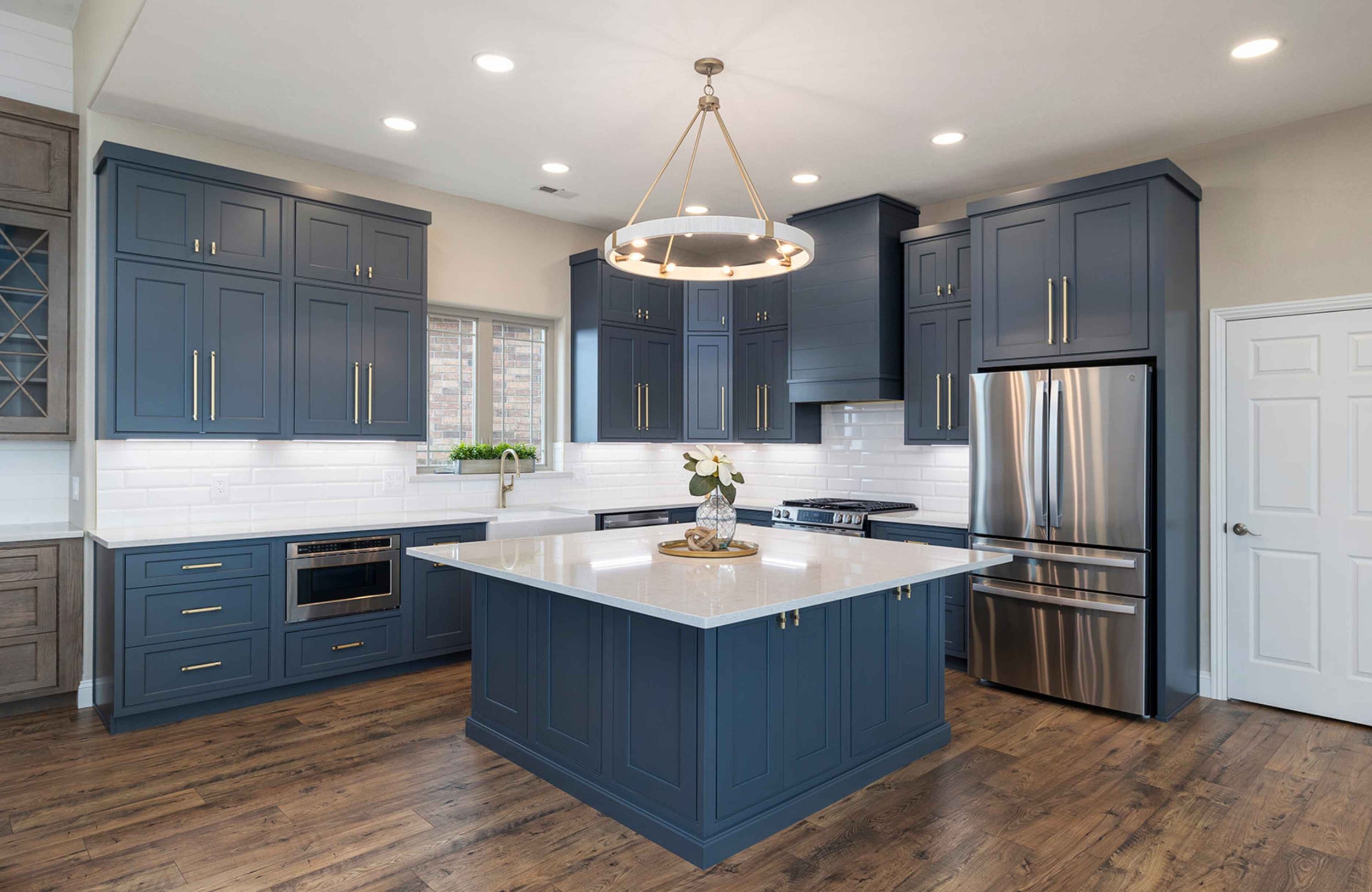 holly-jones-signature-homes-branson-mo-full-gut-renovation-kitchen-with-blue-cabinets-white-quartz-countertops-classy-cozy-vacation-home.jpg
