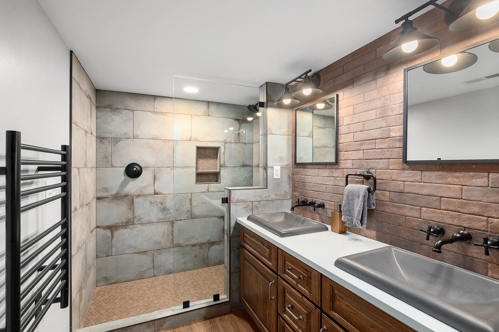 holly-jones-signature-homes-reeds-spring-mo-color-cohesive-home-luxury-bathroom-with-green-and-rich-wood-tones-stone-shower-modern-sophistication-remodel.jpg