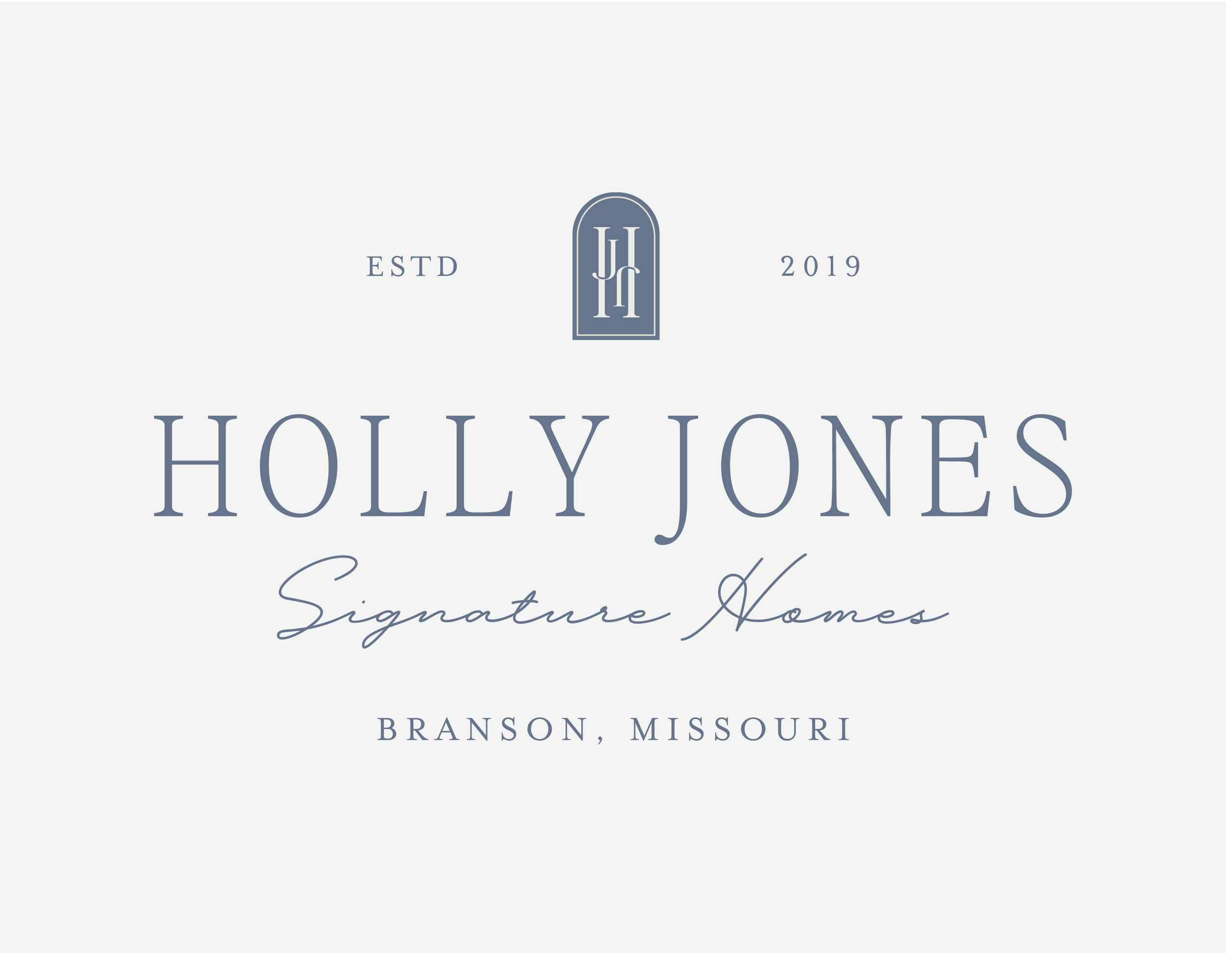 A logo for a company named Holly Jones Signature Homes, established in 2019, located in Branson, Missouri, featuring the words and a monogram in a blue oval design.