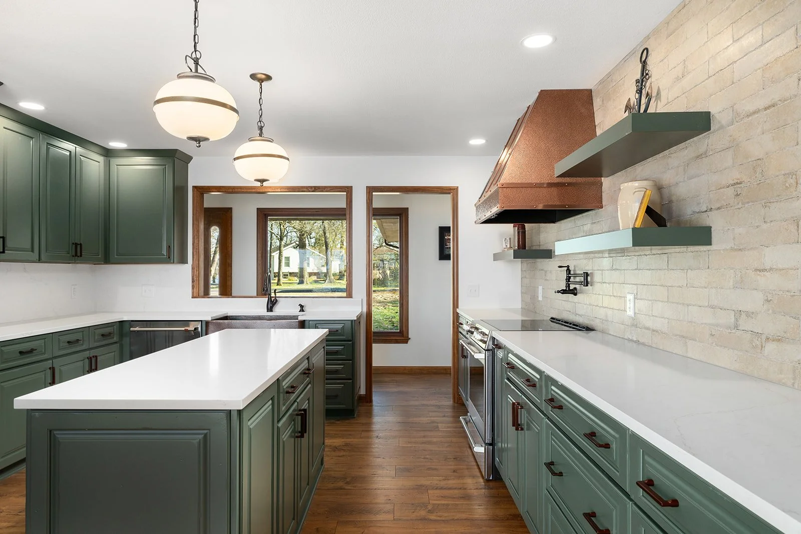 holly-jones-signature-homes-reeds-spring-mo-ready-to-hire-interior-designer-kitchen-with-green-cabinets-white-countertops-copper-range-hood-vacation-home.jpg