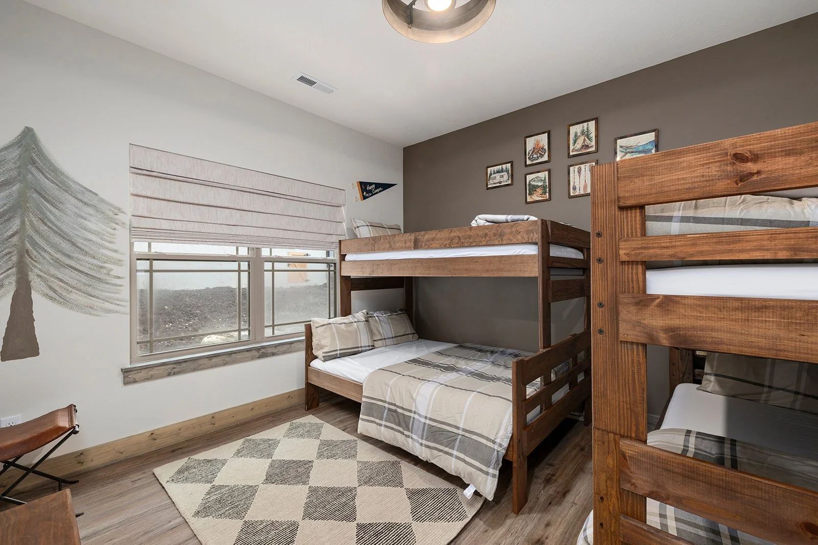holly-jones-signature-homes-shell-knob-mo-length-of-renovation-bunk-room-with-nature-inspired-walls-patterned-rug-transformation.jpg