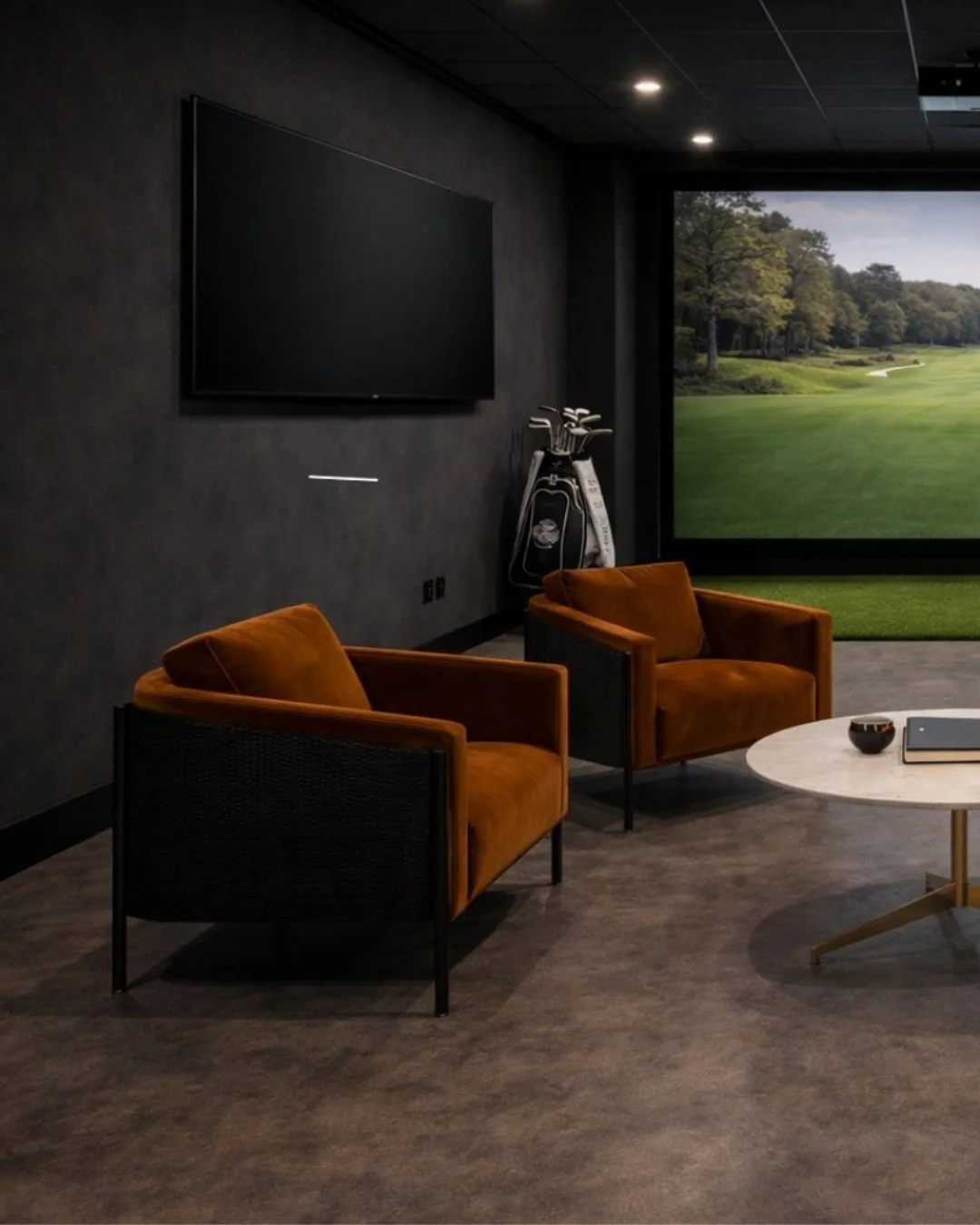 The Coup is built around ease. 

With seating for four to six, the mix of a leather couch and suede chairs creates a space that feels lived in from the start. The bay is made for conversation that flows naturally while the game plays on. 

Less rigid