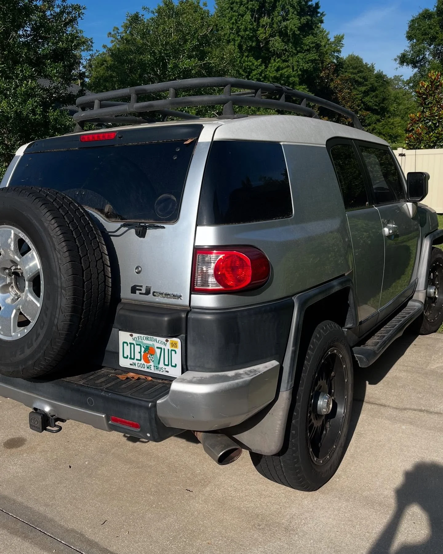 Basic exterior wash with iron remover, clay bar, polish, trim restoration and tire dressing