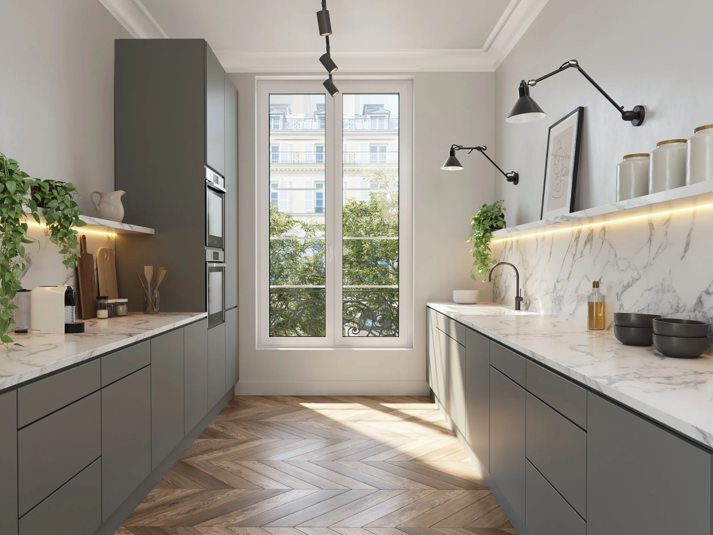 Modern kitchen with gray cabinets, white marble countertops, and a large window showing buildings and trees outside, with black wall-mounted lamps and decorative jars.