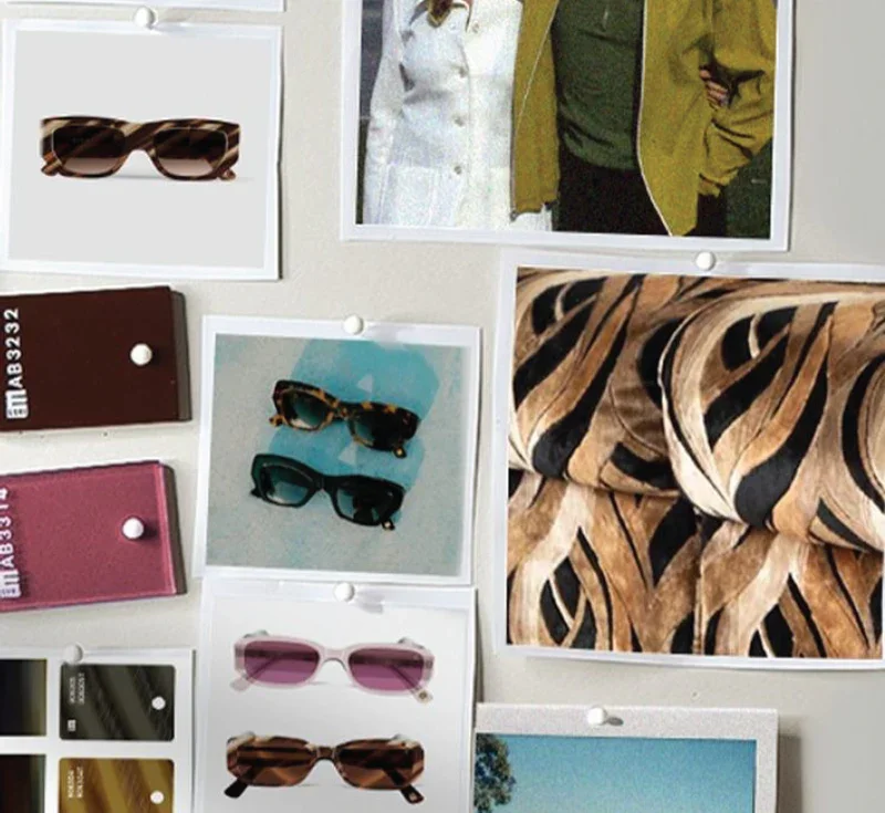 Display of various sunglasses, fabric swatches with animal print, and photographs of people wearing sunglasses on a white board.