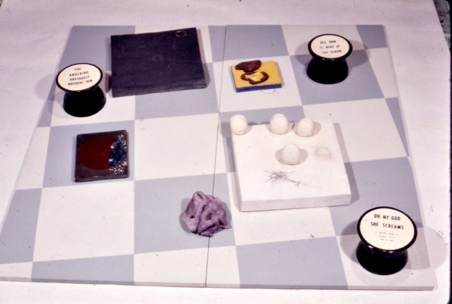 Game (The Knocking), 1968, glazed earthenware objects on panels, 72" x 72"