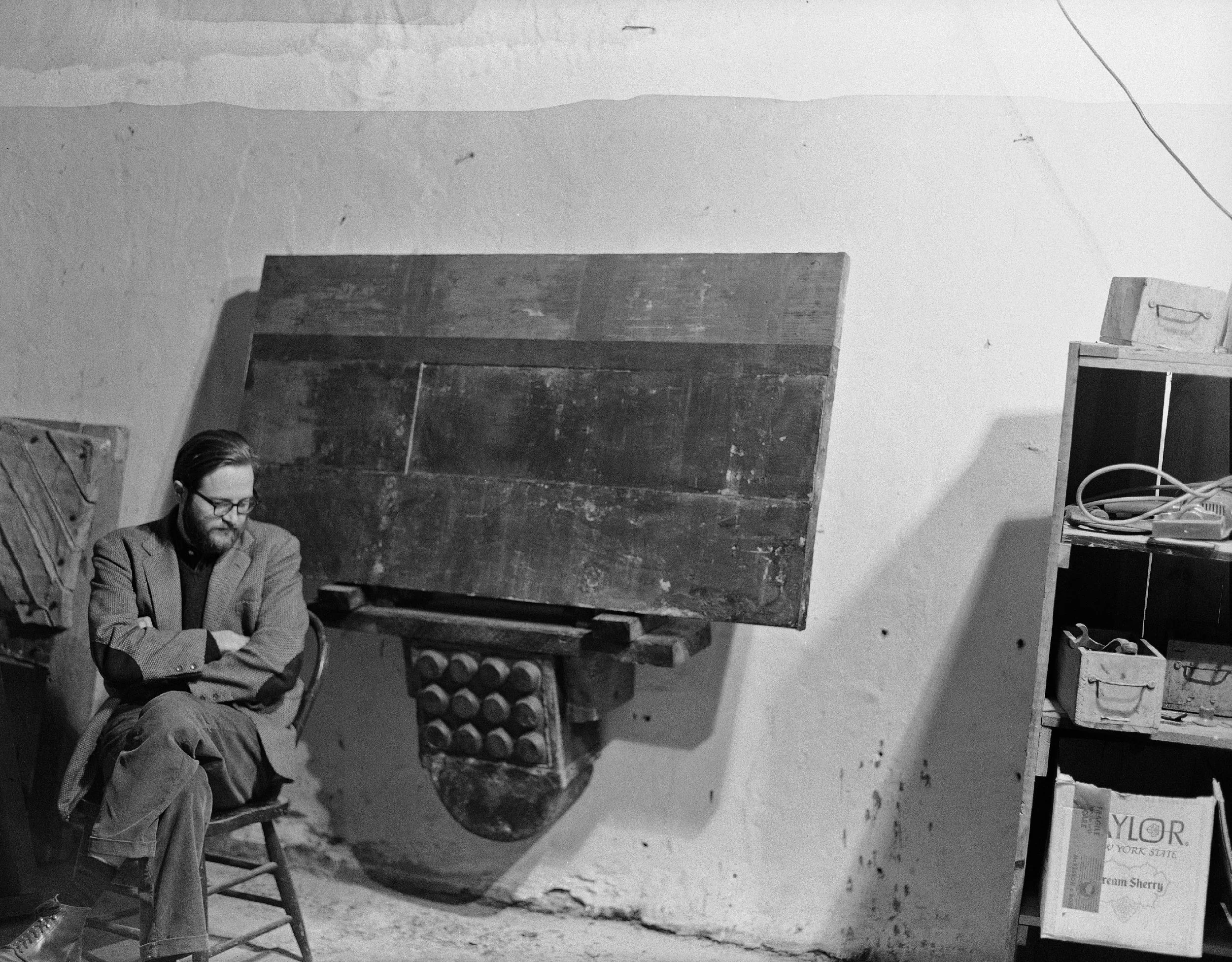Jim Melchert in Berkeley studio, 1963. He shared this studio with Carlos Villa.