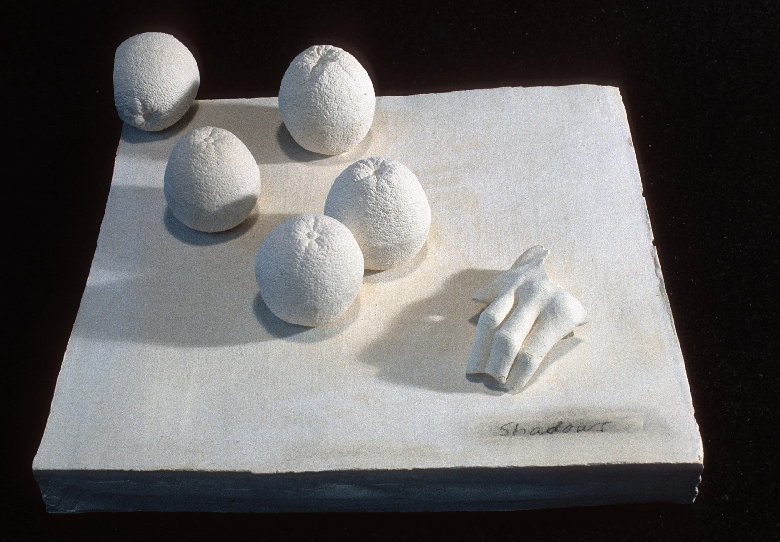 Shadows with Oranges and Hand, 1969 , stoneware with glaze and ceramic decal, 5" x 13.25" x 16"