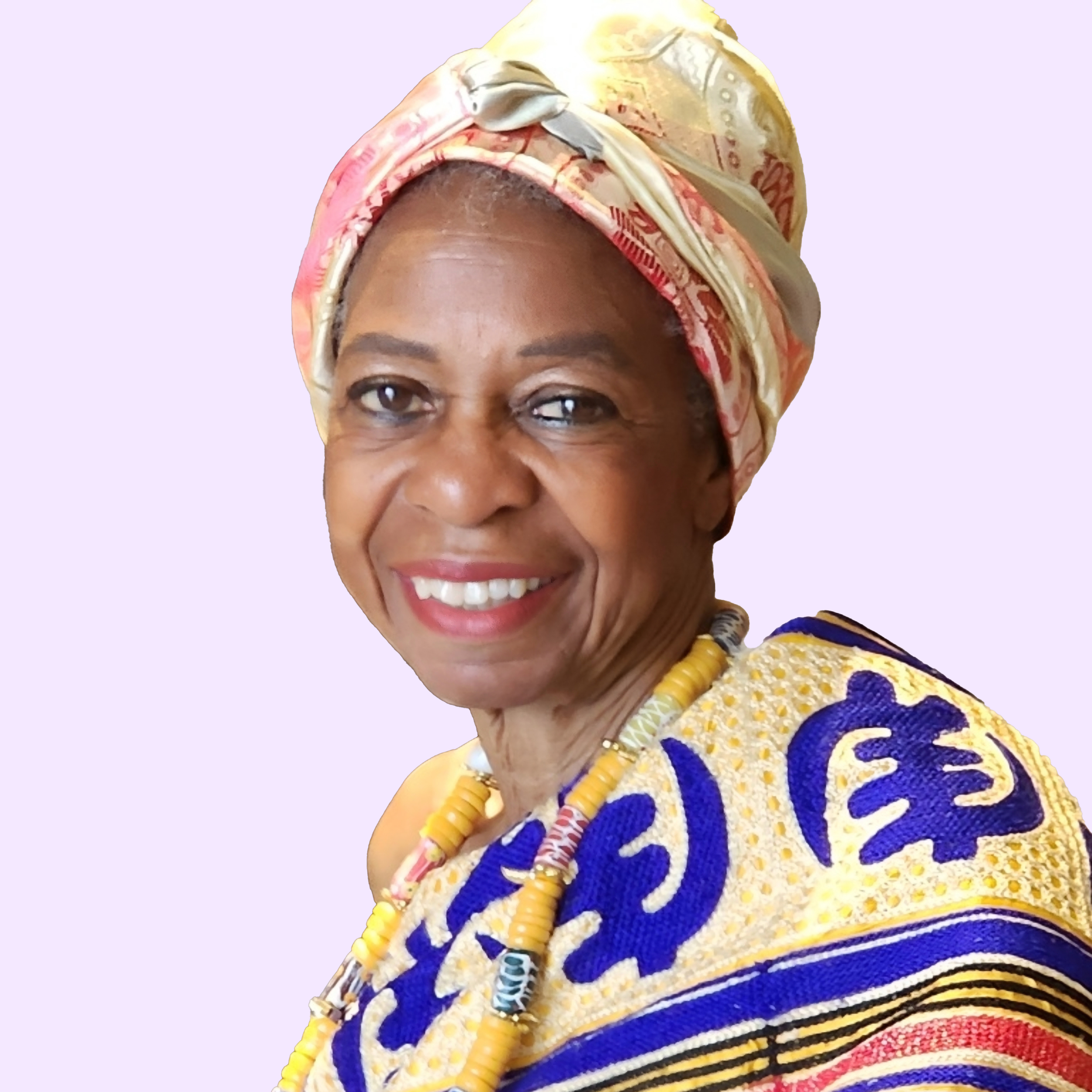 Portrait of an older African American woman wearing a colorful headwrap and a traditional yellow and blue garment, smiling.