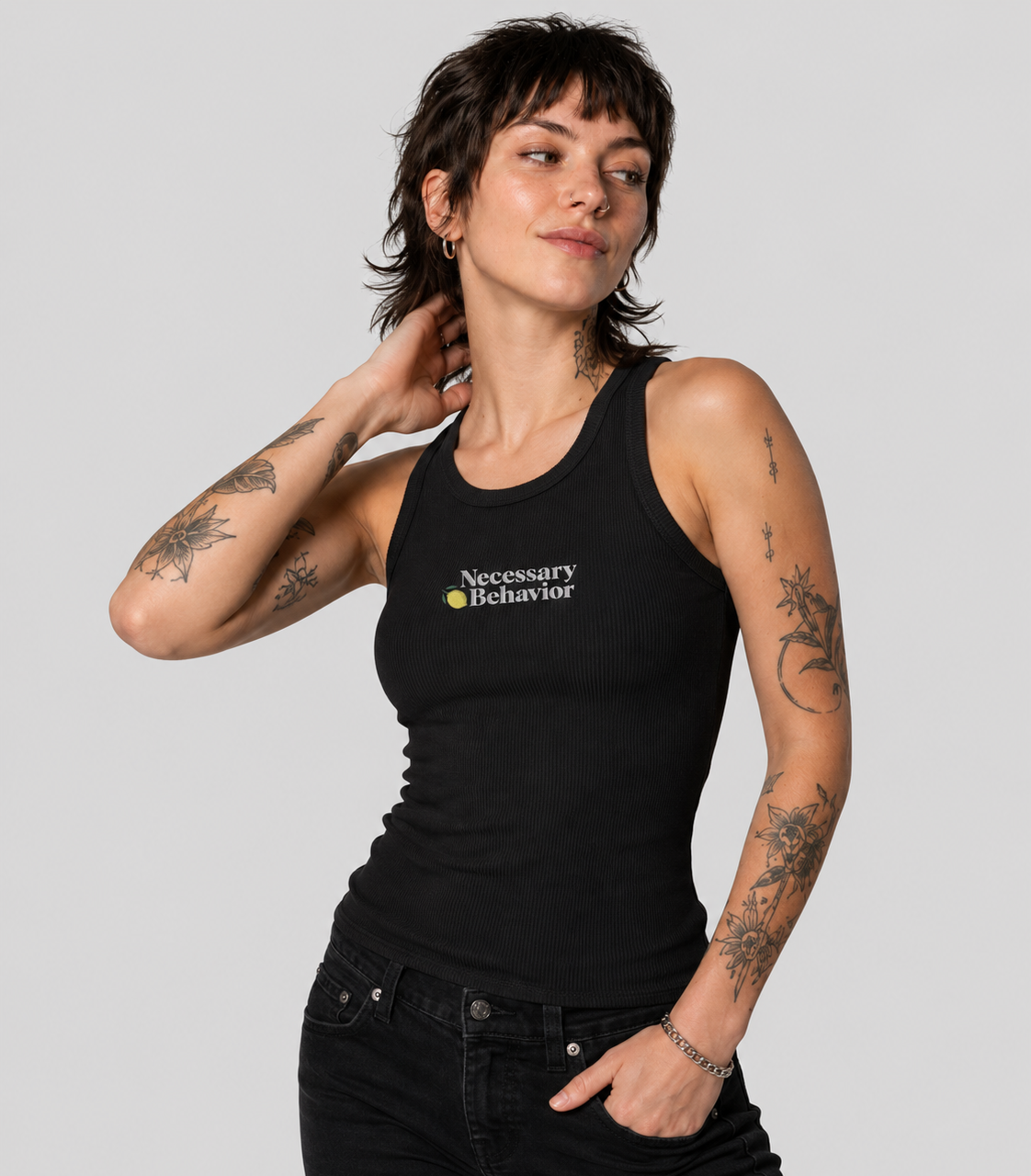 Core logo embroidered on a black tank for the organization’s ongoing merchandise line.