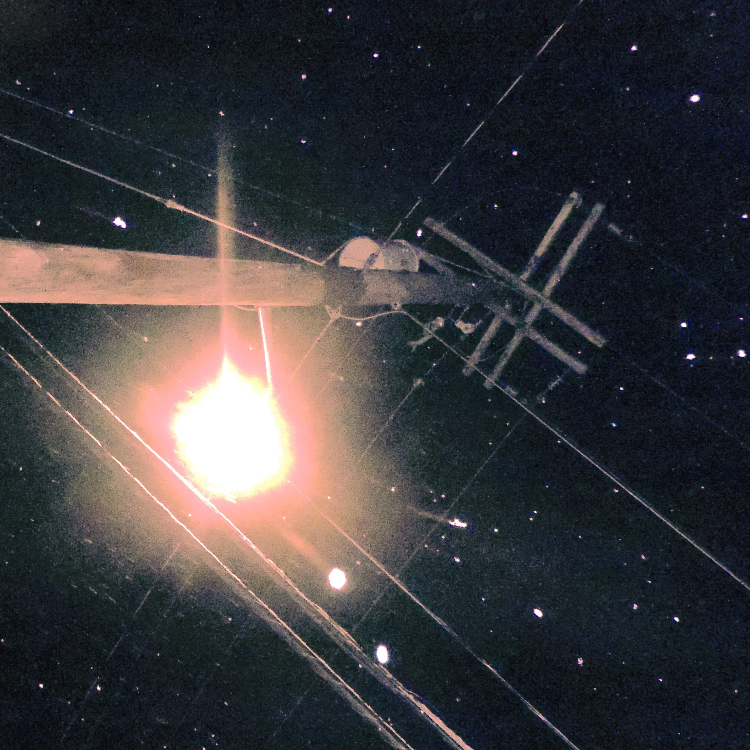 A spacecraft in space near the Sun with stars visible in the background.