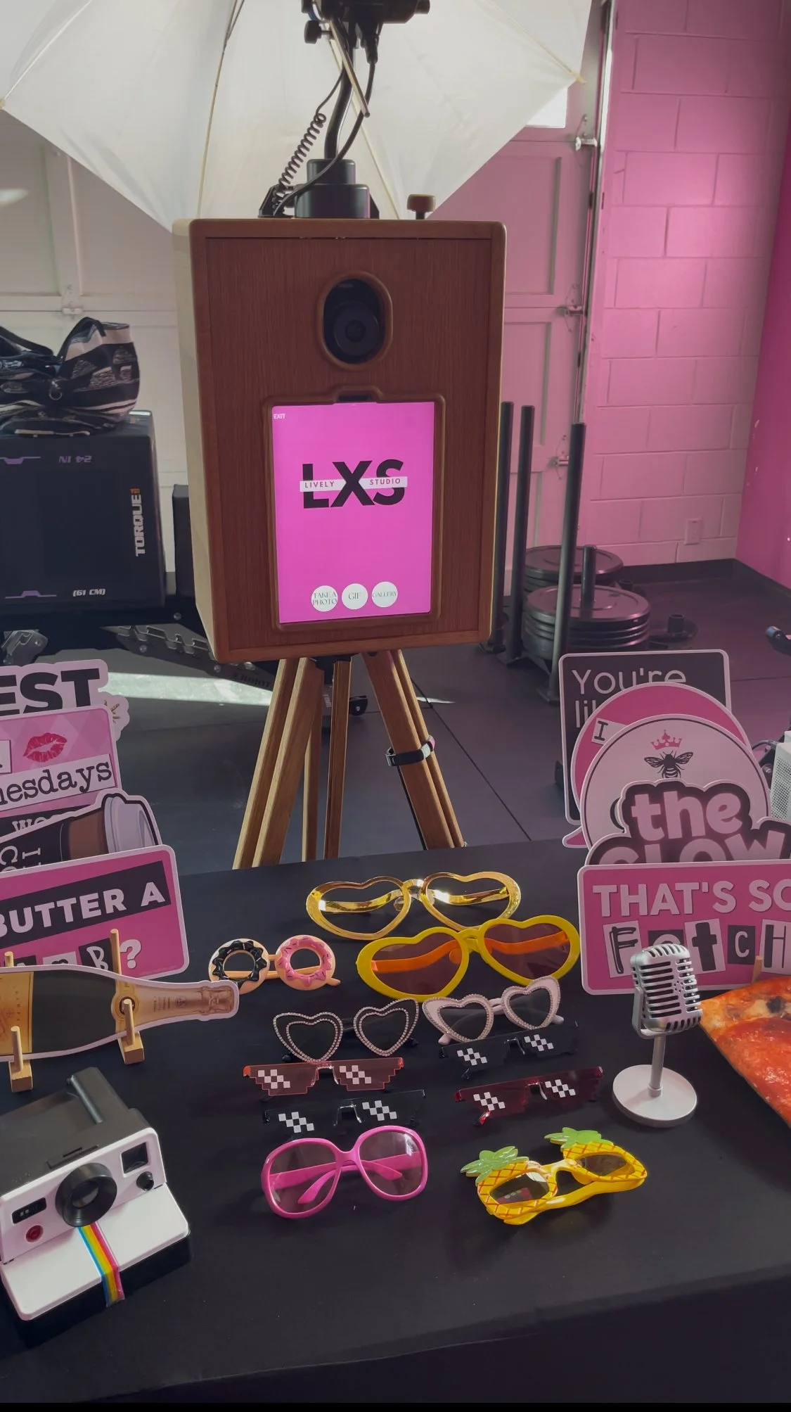 galentine's photo booth with pink mean girls props