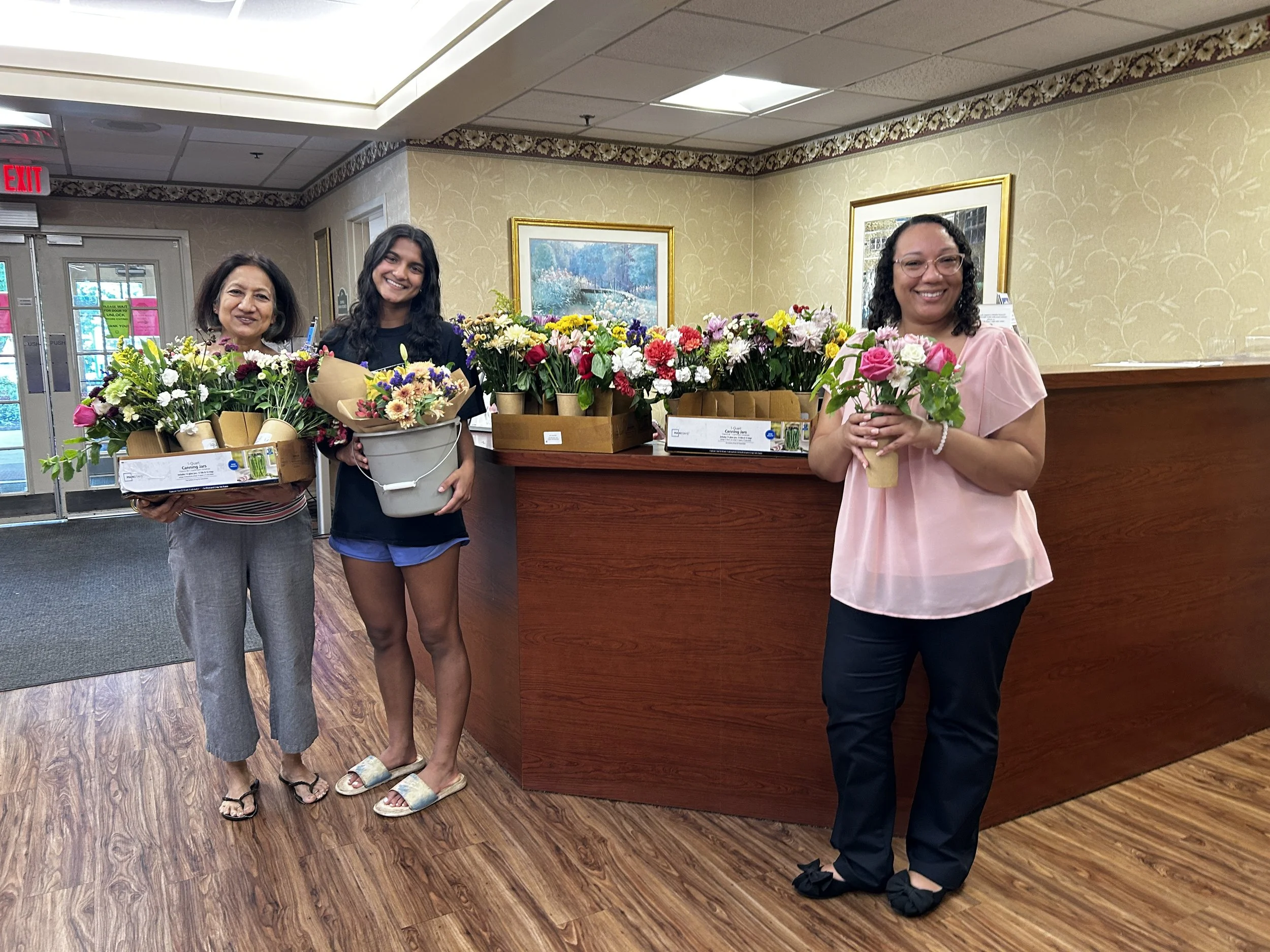 Beautiful flowers with help from Whole Foods to bring smiles to residents of Wayne Center - 8/19!