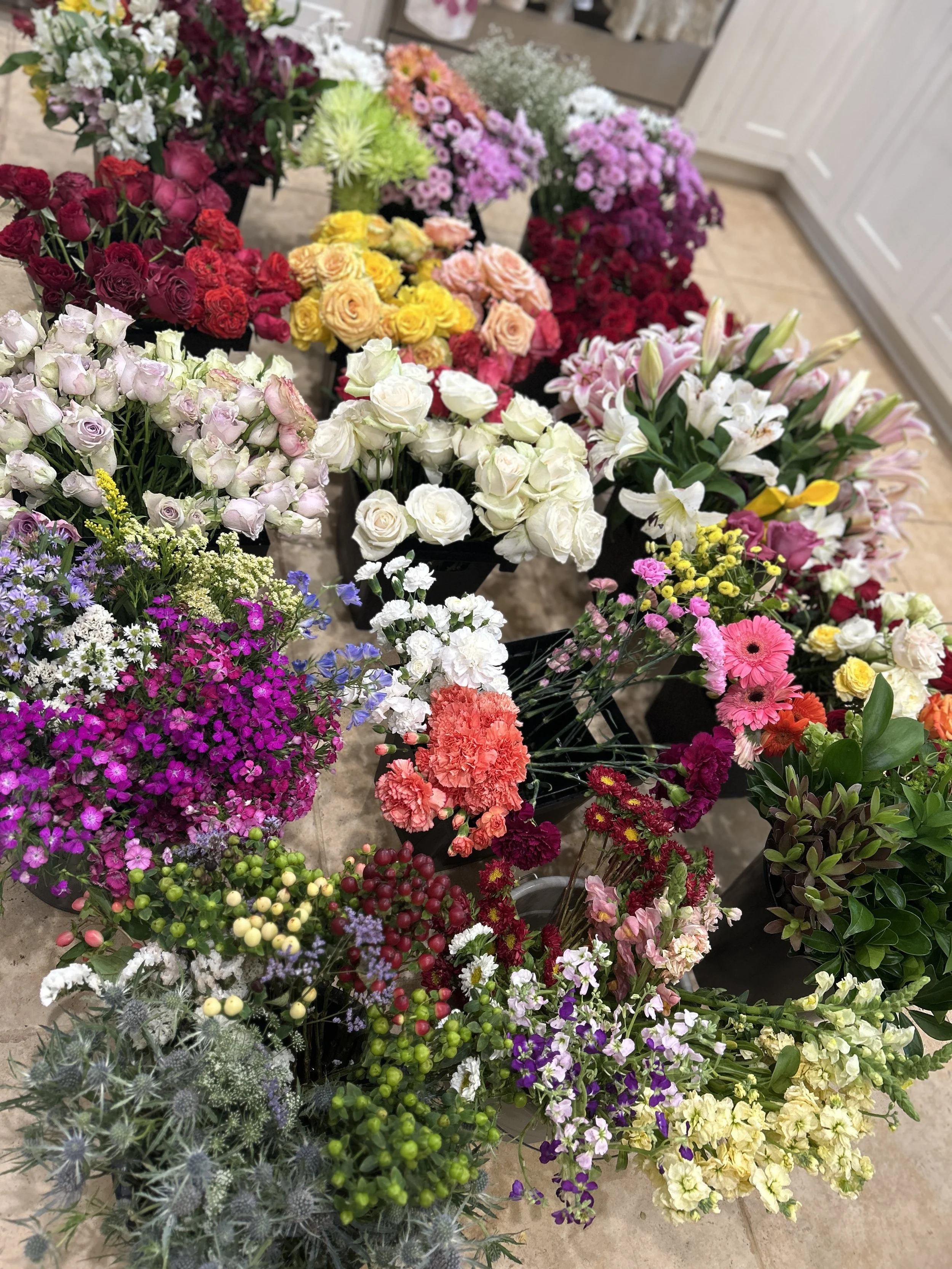 Flowers from the Whole Foods donation, cleaned up and ready to be turned into beautiful bouquets for those in need!