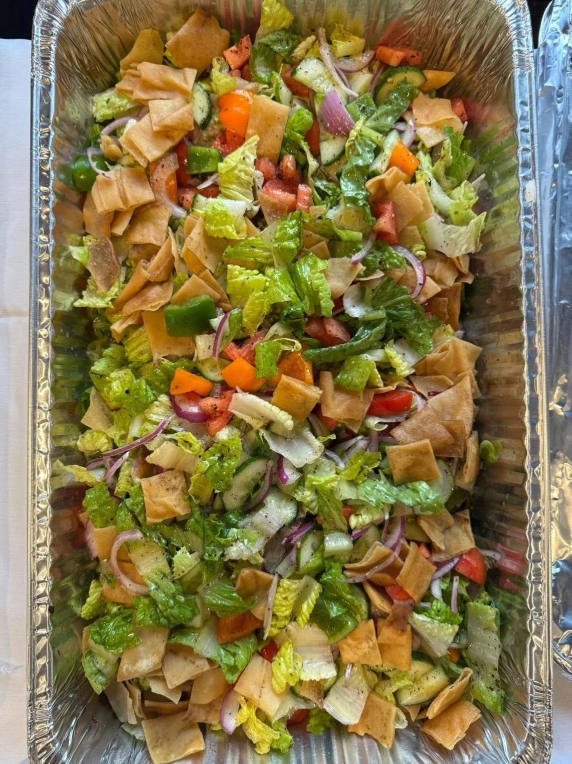 Fattoush salad. Crystal Palace is a caterer and banquet hall in Mt Prospect that specializes in Mediterranean food.