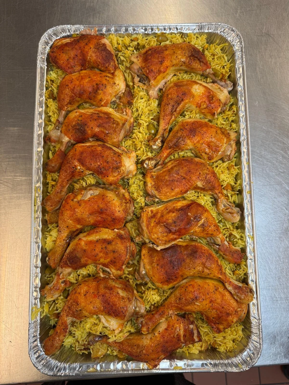 Roast Chicken thighs and biryani. Crystal Palace is a caterer and banquet hall in Mt Prospect that specializes in Mediterranean food.