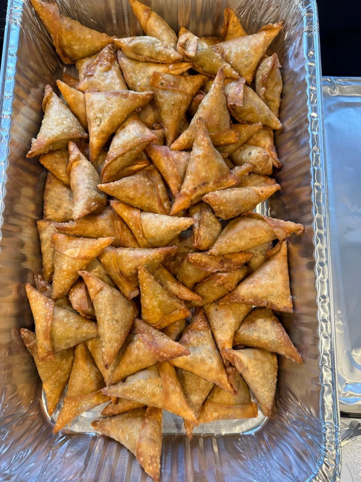 A catering tray of Burek. Crystal Palace is a caterer and banquet hall in Mt Prospect that specializes in Mediterranean food.