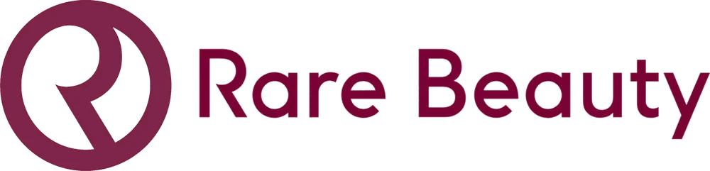 Logo of Rare Beauty featuring a stylized 'R' and 'B' in purple and the text 'Rare Beauty'