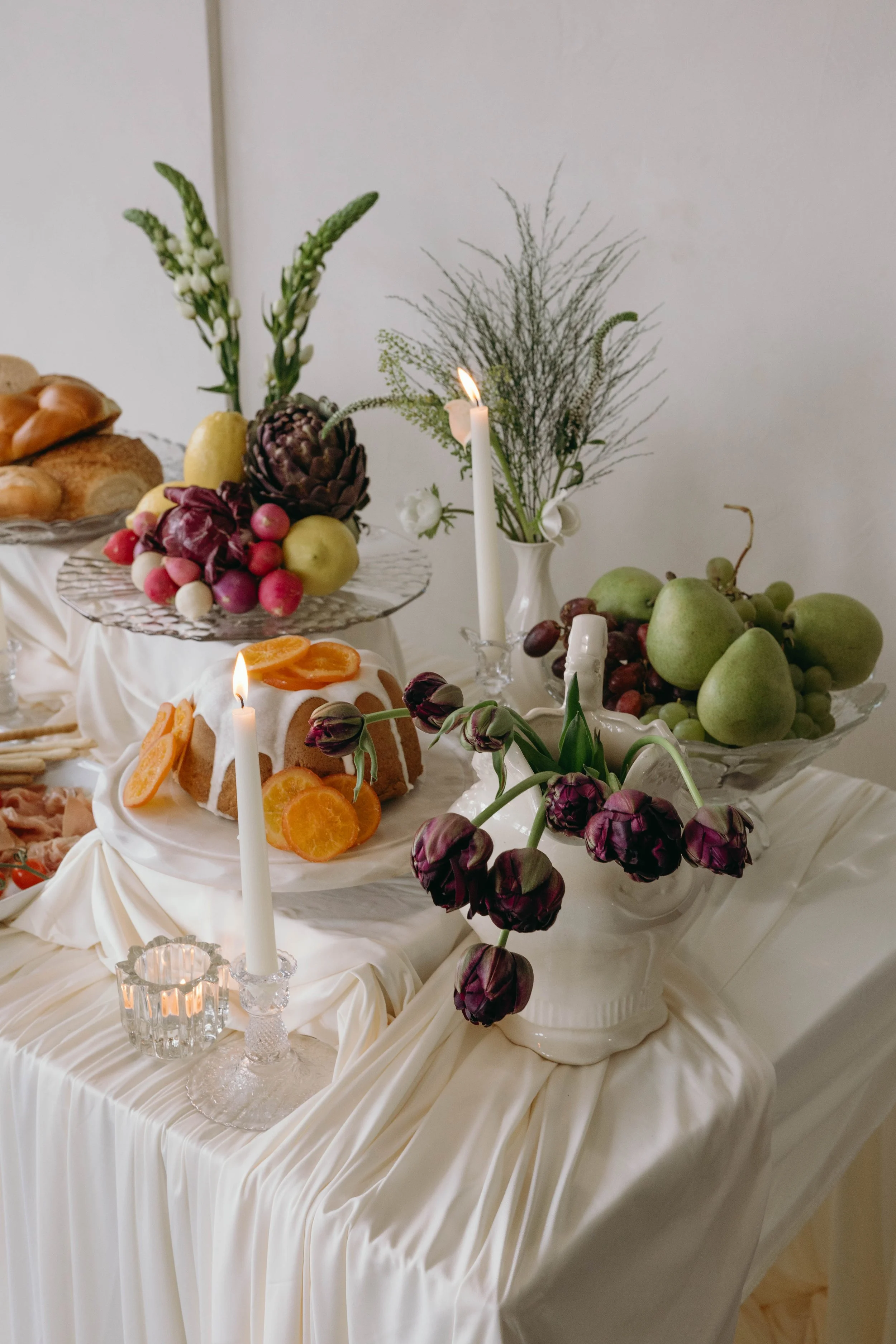 Glass + porcelain grazing table styled by Era