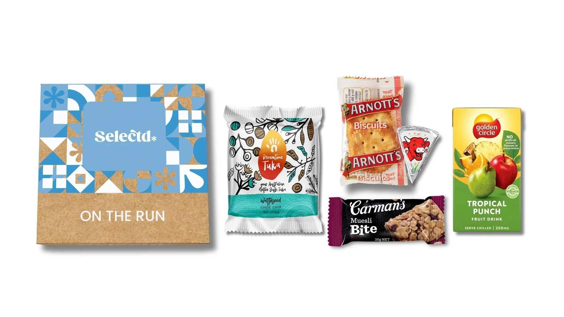 assortment of snack items including a blue and tan box labeled 'Selecta ON THE RUN', a bag of Dreamtime Tuka Wattleseed Choc Chip biscuits, a packet of Arnott's Biscuits, a Carman's Muesli Bite, and a yellow carton of Golden Circle Tropical Punch fruit drink.