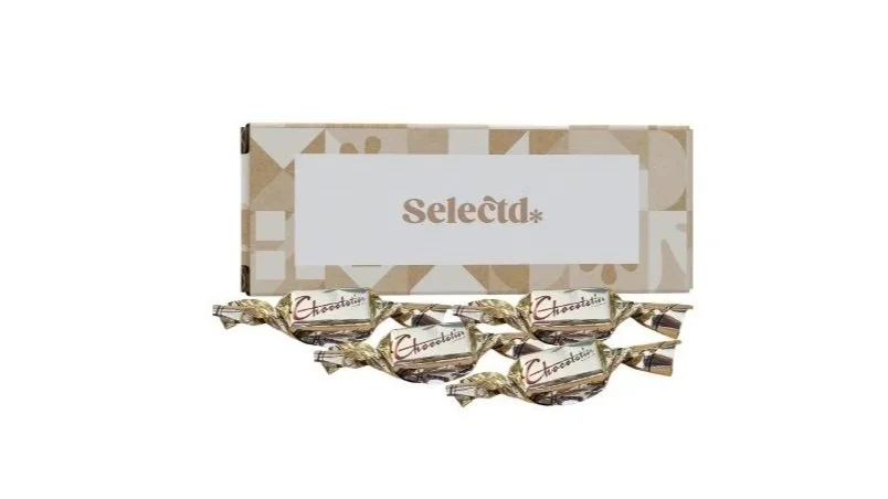 A box of four Select brand chocolates wrapped in gold foil.