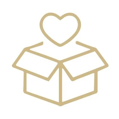 Open cardboard box with a heart coming out of it.