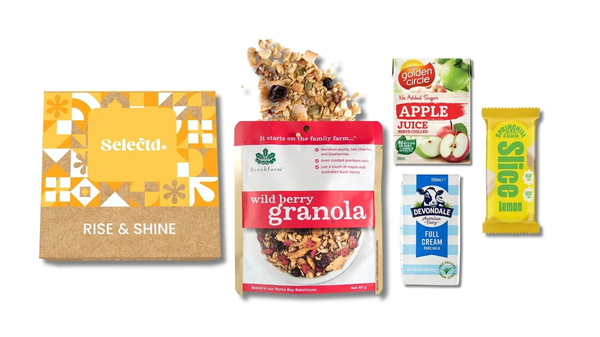 Assorted breakfast items including a box of Rise & Shine cereal, a packet of wild berry granola, a carton of full cream milk, a yellow lemon-flavored snack bar, and a small carton of apple juice.