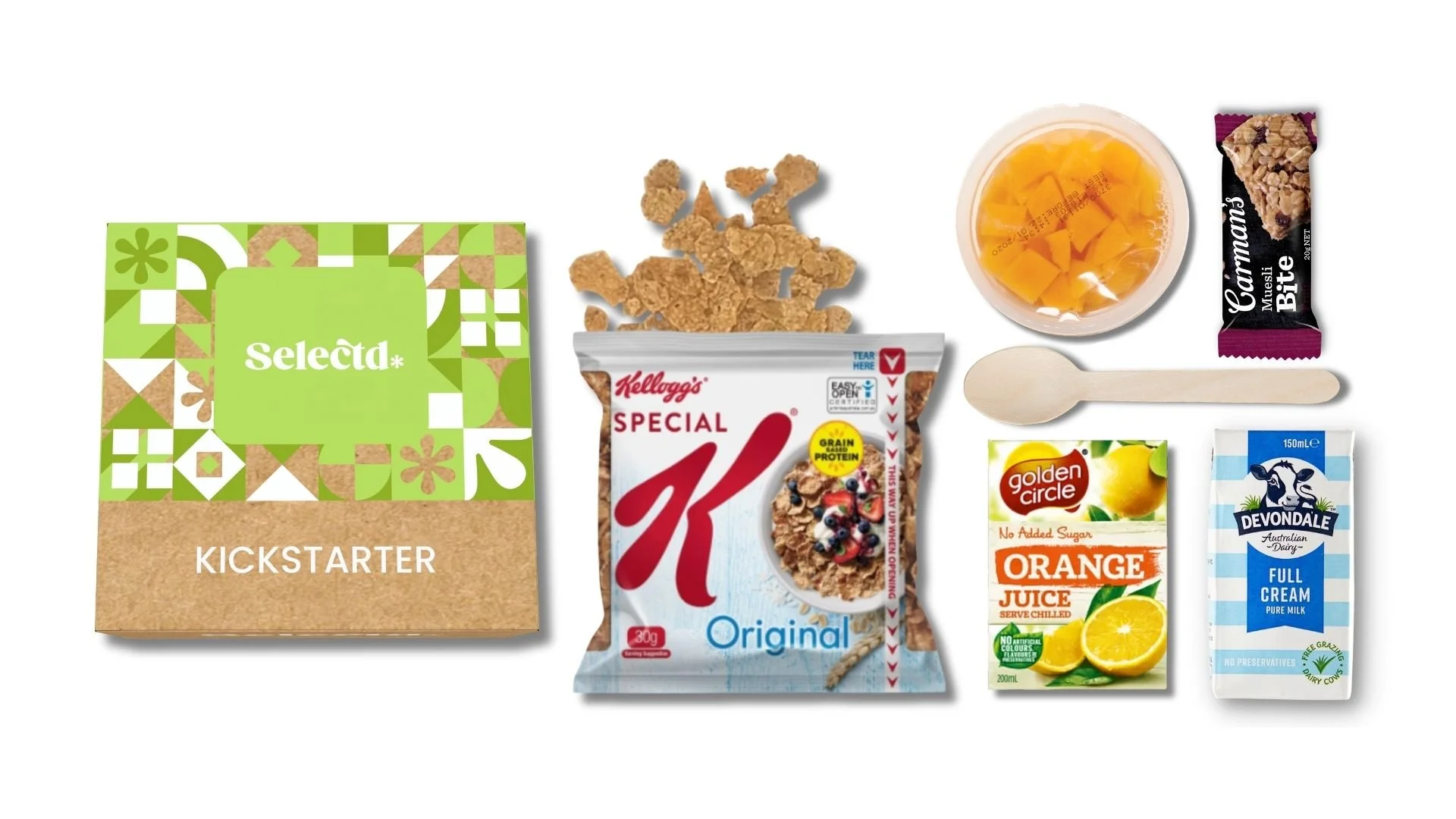 Collection of breakfast items including a green and brown kickstarter box, granola clusters, a cup of orange jelly with fruit pieces, a chocolate cereal bar, a spoon, a container of orange juice, a box of full cream milk, and a packet of full cream milk.