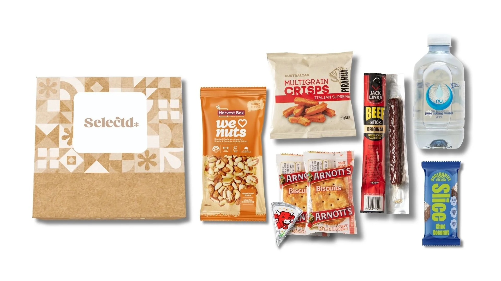 An assortment of snacks including a paper box labeled Selectd, a bag of We Nuts roasted cashews, almonds, Brazil nuts, and peanuts, a bag of Australian multigrain crisps, a packet of Arnott's biscuits, a stick of Jack Link's beef snack, a bottle of spring water, a bag of Sprite Farm sugar cookies, and a chocolate coconut bar.