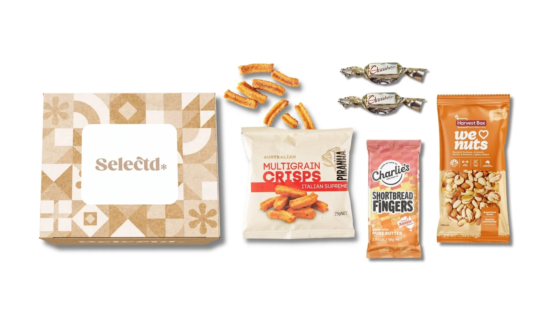 Selection of snack foods including a beige and white patterned box, a bag of multigrain crisps, a bag of shortbread fingers, and a bag of roasted mixed nuts with some crispy snack sticks on top.