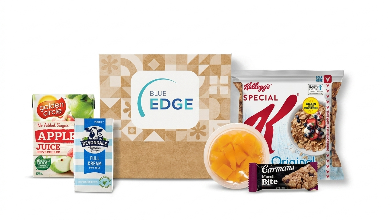 Assorted food items including apple juice, a carton of full cream milk, a box of cereal, a spoonful of canned peaches, a muesli bite, with a custom branded personalised label.