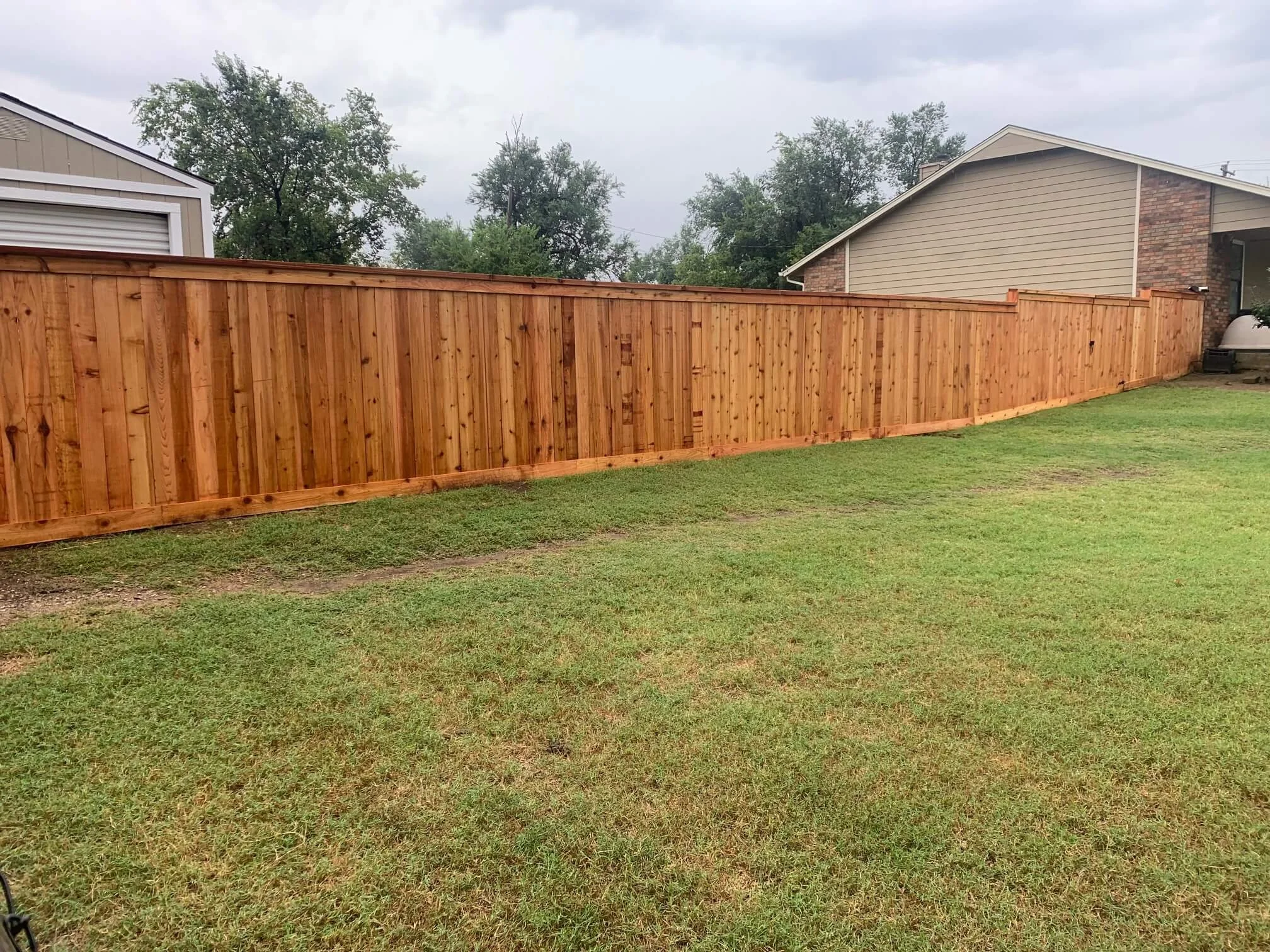 cedar cap and trim privacy wood fence installed in nichols hills, ok