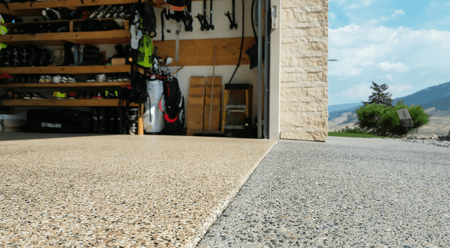 Finished epoxy garage floor and sealed driveway
