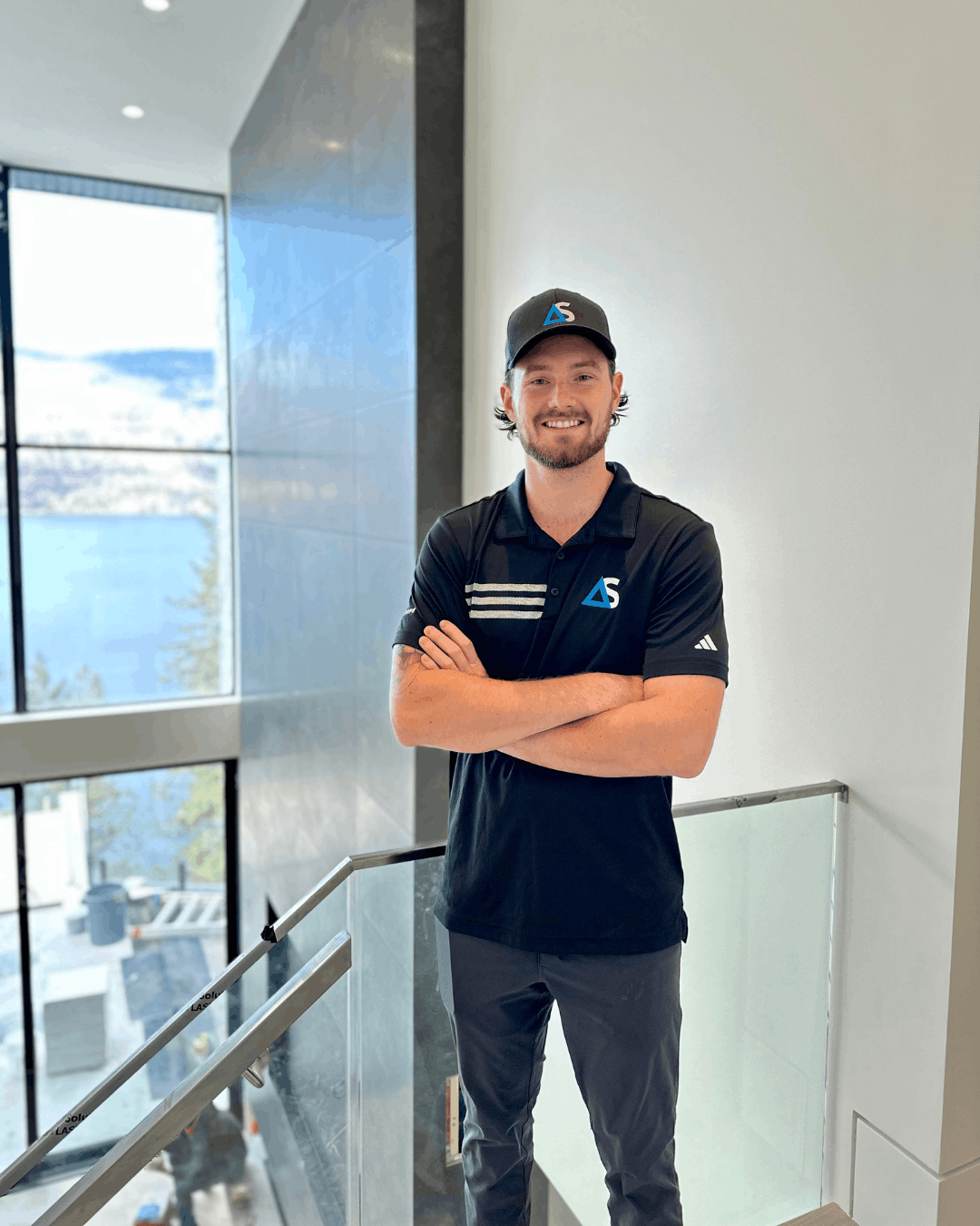 Owner of All-Scope, Tim Varon, standing at an interior painting job site
