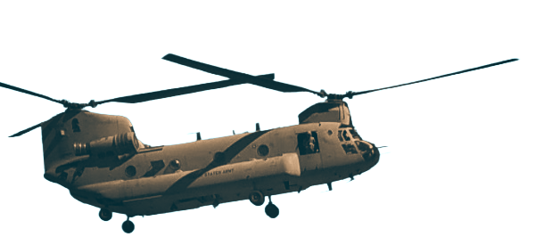 Military helicopter flying against a bright sky.