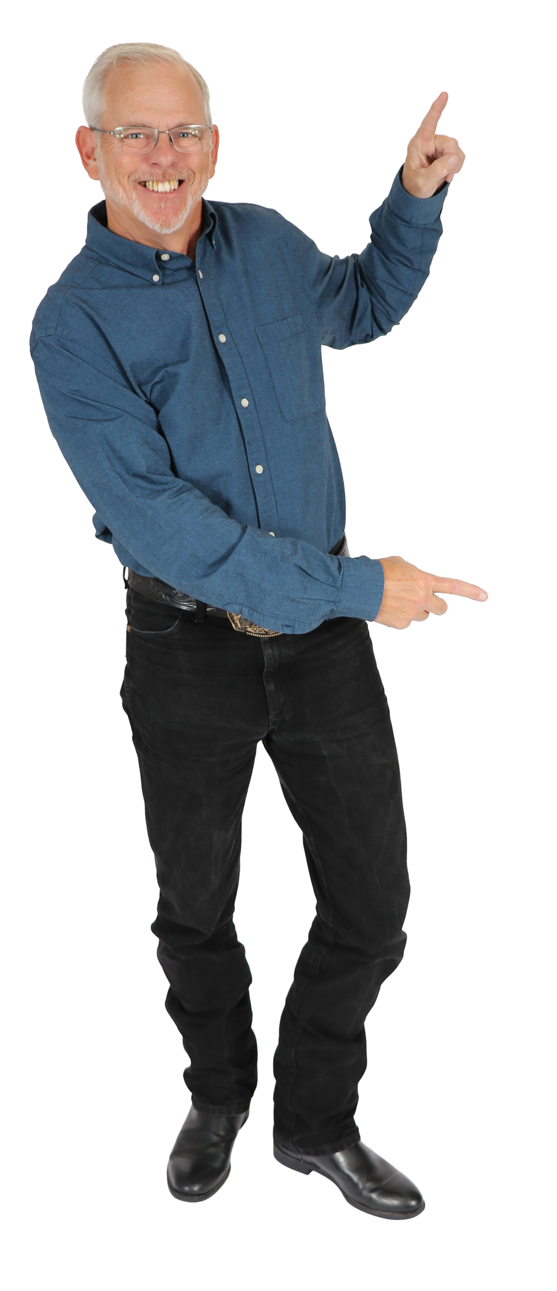 A smiling middle-aged man with gray hair and glasses, wearing a blue button-down shirt, black pants, and black shoes, pointing upward with his right index finger and his left index finger pointing horizontally.