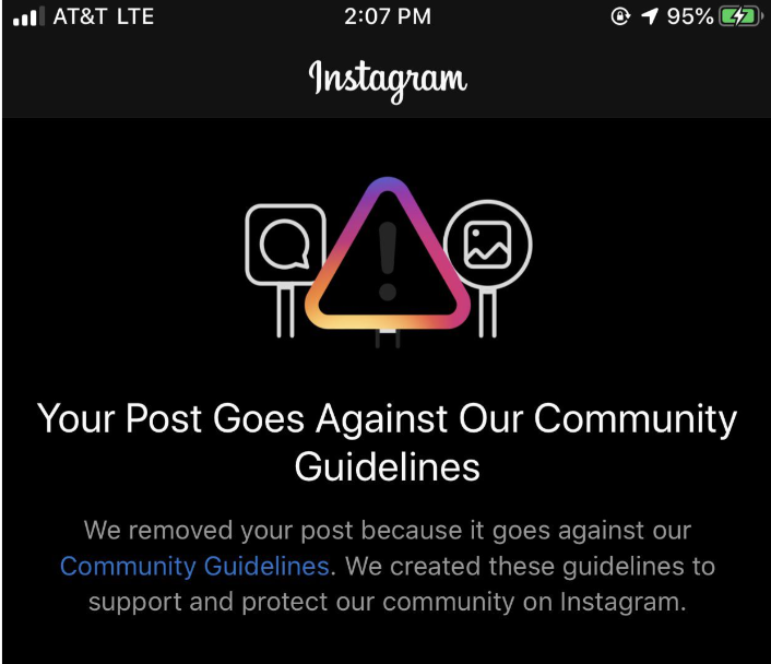 A screenshot of Instagram saying 'Your post goes against our community guidelines'